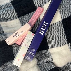 2 lip liner sets, a lipgloss, and lip oil